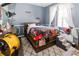 Bright bedroom with window seat and built-in shelves at 12528 Roseland Dr, New Port Richey, FL 34654
