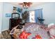 Bright bedroom with a large window and views of the backyard at 12528 Roseland Dr, New Port Richey, FL 34654