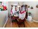 Formal dining room with hardwood floors and a large window at 12528 Roseland Dr, New Port Richey, FL 34654