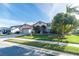 House exterior with palm trees and manicured lawn at 12528 Roseland Dr, New Port Richey, FL 34654