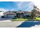 One-story home with a two-car garage and landscaped yard at 12528 Roseland Dr, New Port Richey, FL 34654