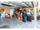 Garage with lots of storage space and shelving at 12528 Roseland Dr, New Port Richey, FL 34654