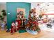 Living room with a Christmas tree and electric fireplace at 12528 Roseland Dr, New Port Richey, FL 34654