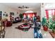 Spacious living room with tile floors and lots of natural light at 12528 Roseland Dr, New Port Richey, FL 34654