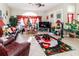 Spacious living room with tile floors and a large window at 12528 Roseland Dr, New Port Richey, FL 34654