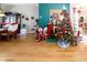 Bright living room with a Christmas tree and hardwood floors at 12528 Roseland Dr, New Port Richey, FL 34654