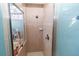 Clean shower with tile surround and glass enclosure at 12528 Roseland Dr, New Port Richey, FL 34654