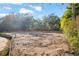 Cleared lot ready for construction; partially fenced at 2303 S Hesperides St, Tampa, FL 33629