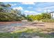 Large cleared lot ready for building, partially fenced at 2303 S Hesperides St, Tampa, FL 33629