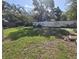 Spacious backyard with a fenced perimeter at 5700 Bay Blvd, Port Richey, FL 34668