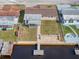 Bird's eye view of home, dock, and backyard patio at 12637 2Nd Isle, Hudson, FL 34667