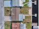 High-angle view of the house and backyard with a dock at 12637 2Nd Isle, Hudson, FL 34667