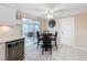 Kitchen with breakfast nook and access to a sunroom at 12637 2Nd Isle, Hudson, FL 34667