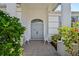 Front entrance with double doors and white columns at 1416 Davenport Dr, New Port Richey, FL 34655