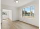 Living room with hardwood floors and large window at 2449 16Th N St, St Petersburg, FL 33704