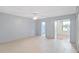 Spacious bedroom with light walls and wood-look floors at 2360 World Parkway Blvd # 4, Clearwater, FL 33763