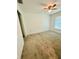 Bright bedroom with carpeted floor and ceiling fan at 27173 Simona Ave, Brooksville, FL 34602