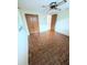 Bedroom with parquet flooring and double door closet at 3334 Fairmount Dr, Holiday, FL 34691