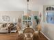 Casual dining area with glass table and wicker chairs at 11654 Holly Ann Dr, New Port Richey, FL 34654