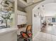 Small home office space tucked away in kitchen area at 11654 Holly Ann Dr, New Port Richey, FL 34654