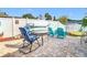 Seating area in backyard with lovely outdoor space, perfect for entertaining Gathering and friends at 12832 3Rd Isle, Hudson, FL 34667