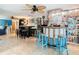 Finished basement features custom bar, wine rack, and dining area, perfect for entertaining guests at 12832 3Rd Isle, Hudson, FL 34667