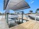 Private boat lift, covered to keep your watercraft in excellent condition at 12832 3Rd Isle, Hudson, FL 34667