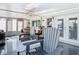 Spacious enclosed patio for year-round entertainment at 12832 3Rd Isle, Hudson, FL 34667