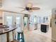 Bright, updated kitchen with white cabinets, stainless steel appliances, and an open layout perfect for entertaining at 12832 3Rd Isle, Hudson, FL 34667