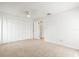 Bedroom with double door closet and carpet flooring at 2027 Beckwith Ave, Spring Hill, FL 34608