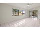 Living room with sliding doors to backyard at 2027 Beckwith Ave, Spring Hill, FL 34608