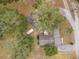 Overhead view of house and surrounding landscape at 37351 Neighbors Path, Zephyrhills, FL 33542