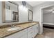Double vanity bathroom with granite countertops at 37351 Neighbors Path, Zephyrhills, FL 33542