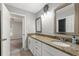 Double vanity bathroom with granite countertops at 37351 Neighbors Path, Zephyrhills, FL 33542