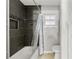 Clean bathroom with shower/tub combo and a window at 37351 Neighbors Path, Zephyrhills, FL 33542