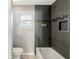 Bathroom with shower/tub combo and tile surround at 37351 Neighbors Path, Zephyrhills, FL 33542