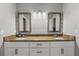 Double vanity bathroom with granite countertop and two sinks at 37351 Neighbors Path, Zephyrhills, FL 33542