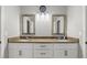 Double vanity bathroom with granite countertops at 37351 Neighbors Path, Zephyrhills, FL 33542