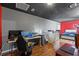 Bedroom with a bed and a workspace for a laptop at 37351 Neighbors Path, Zephyrhills, FL 33542