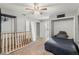 Bedroom with a bed, closet, and built-in shelving at 37351 Neighbors Path, Zephyrhills, FL 33542