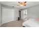 Bright bedroom with double door closet and ensuite bathroom access at 37351 Neighbors Path, Zephyrhills, FL 33542