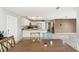 Dining area with kitchen view and wooden table at 37351 Neighbors Path, Zephyrhills, FL 33542