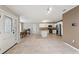 Open concept kitchen with stainless steel appliances and island at 37351 Neighbors Path, Zephyrhills, FL 33542