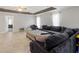 Relaxing living room with sectional sofa and tile floors at 37351 Neighbors Path, Zephyrhills, FL 33542