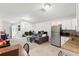 Living room features an open floor plan and kitchen at 37351 Neighbors Path, Zephyrhills, FL 33542