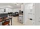Open living area with kitchen and bathroom at 37351 Neighbors Path, Zephyrhills, FL 33542