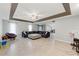 Open living area with sectional sofa and large windows at 37351 Neighbors Path, Zephyrhills, FL 33542