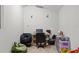 Bright and functional home office with a desk and storage at 37351 Neighbors Path, Zephyrhills, FL 33542