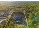 Aerial view of the backyard with a pool and privacy at 7376 Fall St, Brooksville, FL 34613