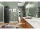 Elegant bathroom with dual vanity, stylish mirror, and modern fixtures at 7376 Fall St, Brooksville, FL 34613